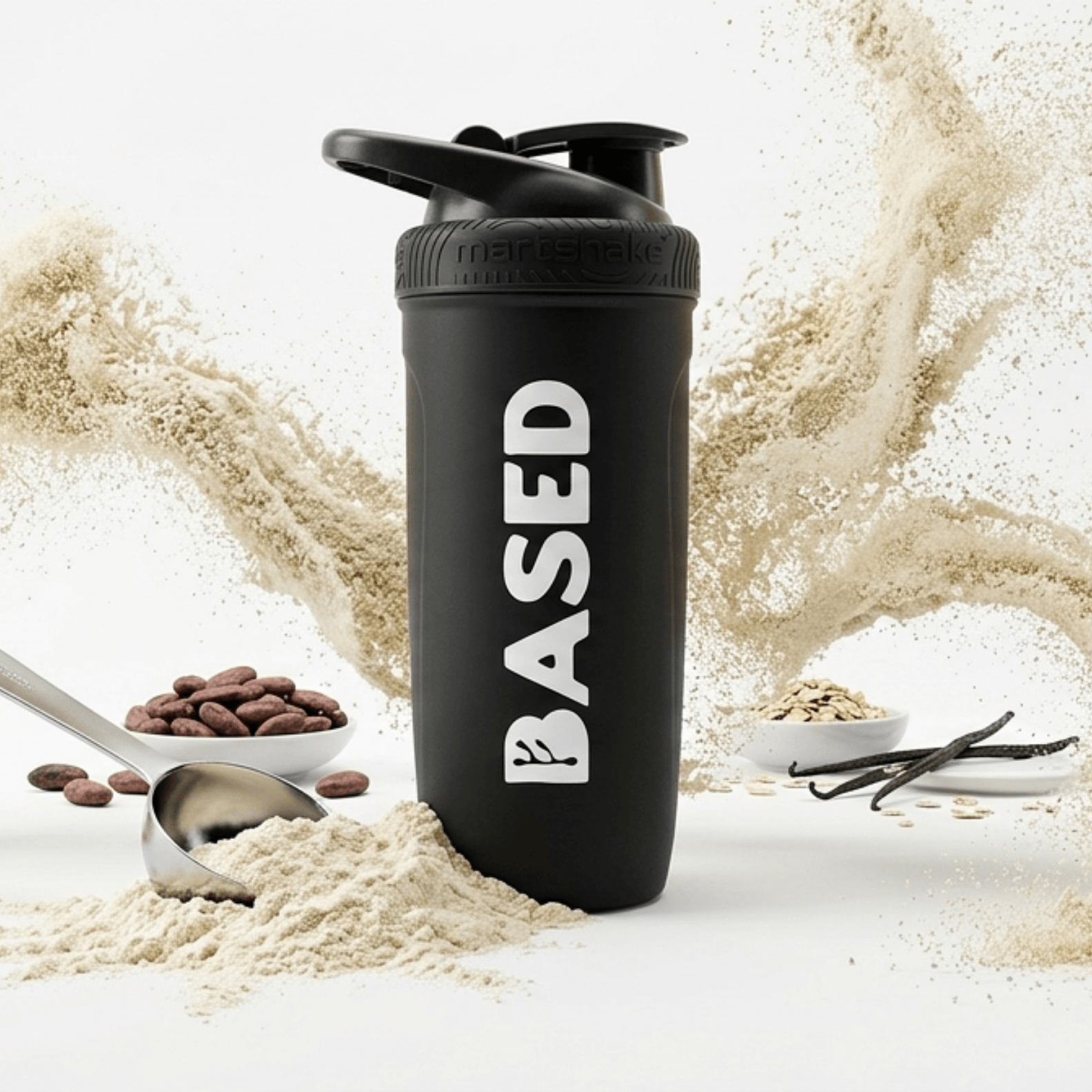 BASED Steel Shaker | 900ml Black with protein powder and ingredients surrounding it.